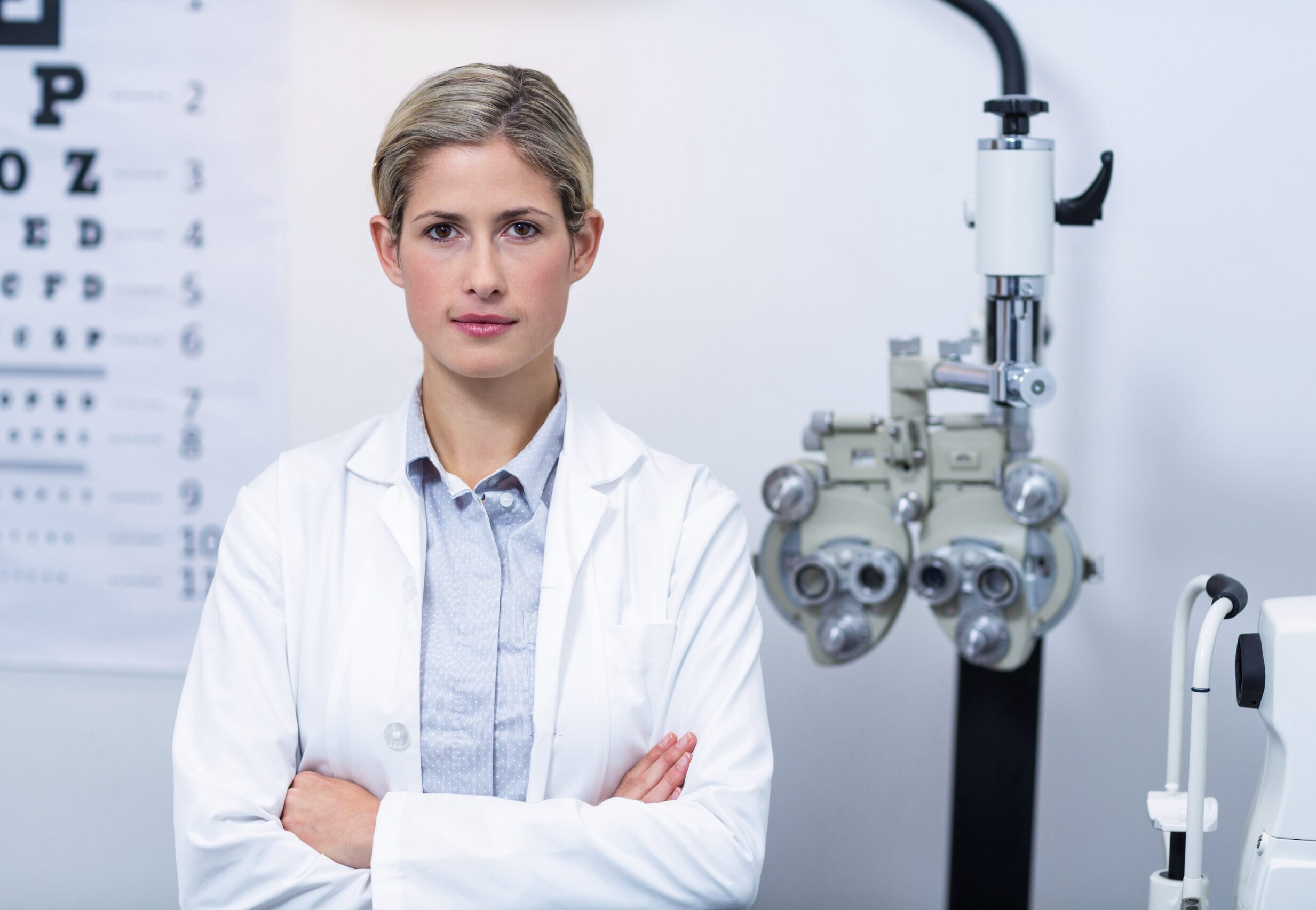 optometrist, female optometrist standing in an ophthalmology clinic,