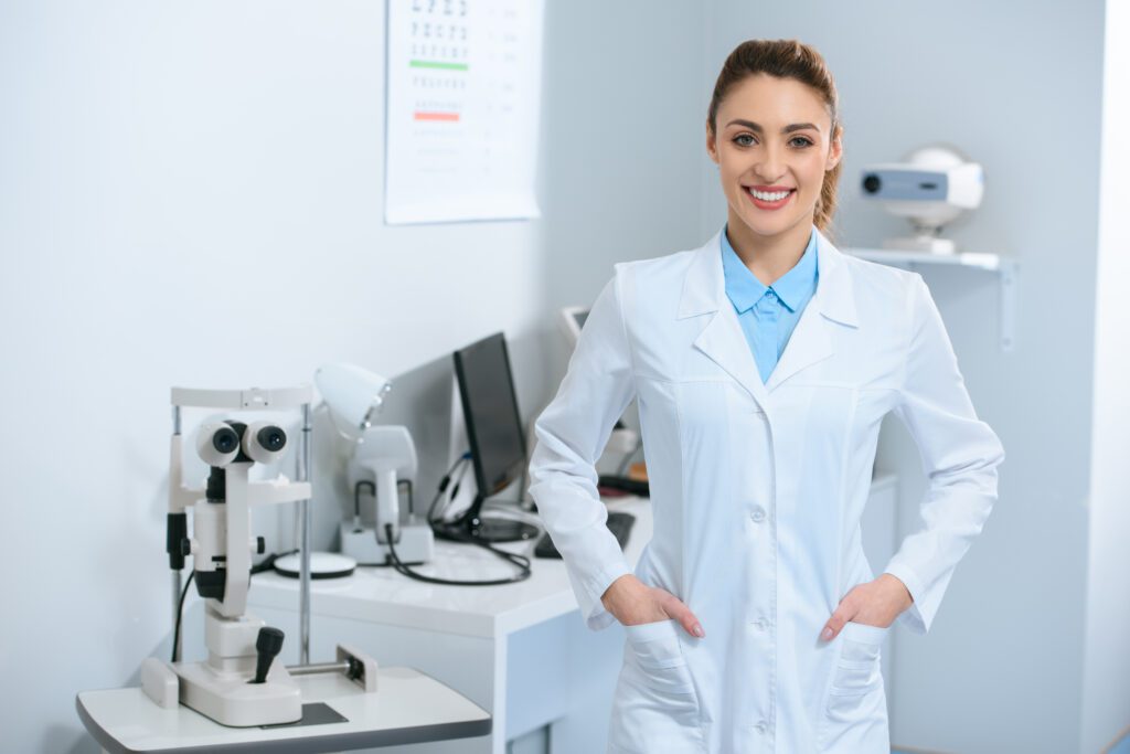 Optometrists, male and female optometrist, optometrist in an optical clinc, male and female optometrist in an optical clinic, optometrists smiling in an optical clinic